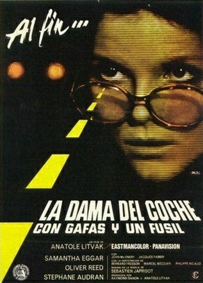 Sección visual de La dama del coche con gafas y un fusil FilmAffinity