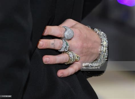 Miley Cyrus Jewelry Detail Attends The 2019 Vanity Fair Oscar Party