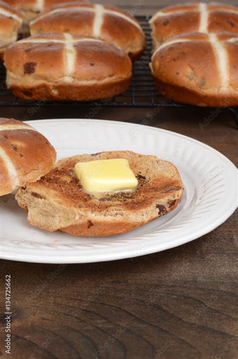 Toasted Hot Cross Bun With Butter Stock Photo Adobe Stock
