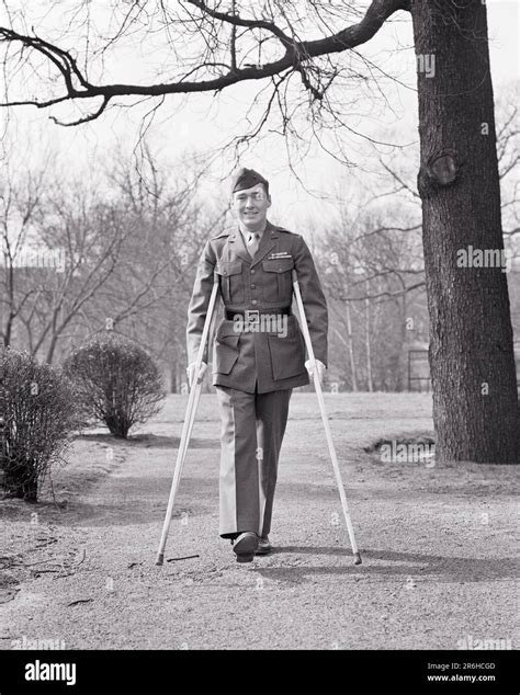 1940s Man Wounded Marine Veteran In Uniform Smiling Walking Towards