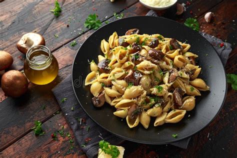 Carbonara Mushrooms Pasta Conchiglie with Creamy Sauce, Parmesan Cheese and Herbs Stock Image ...