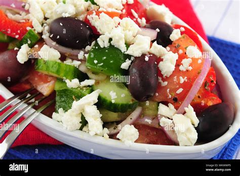 Greek salad with feta cheese and black kalamata olives Stock Photo - Alamy