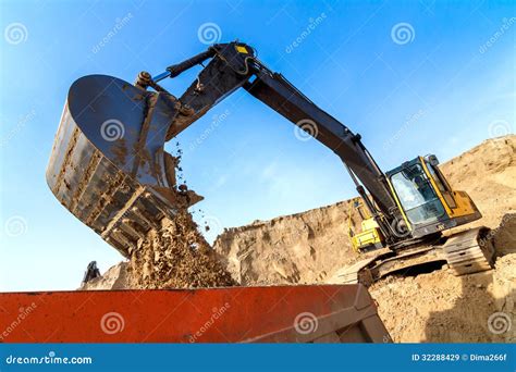 Excavator Loading Dumper Truck Stock Image Image Of Mover