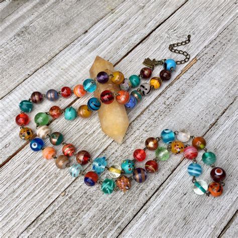 Artisan Glass Beaded Necklace Etsy Glass Bead Necklace Beaded Necklace Beaded Memory Wire