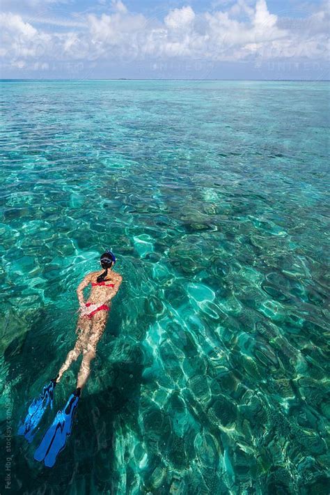 Woman Snorkelling In The Maldives By Stocksy Contributor Eyes On Asia