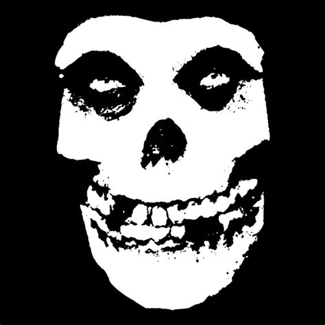 A Black And White Image Of A Skull