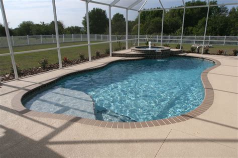 This Custom Pool By Duwet Inc Features A Sun Shelf And A Raised Corner