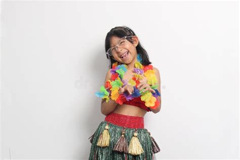 Year Old Latina Girl With Glasses And Hawaiian Skirt Enjoys Dancing And Does Hawaii Dance