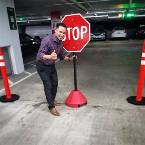 Red Stop Sign in Parking Garage