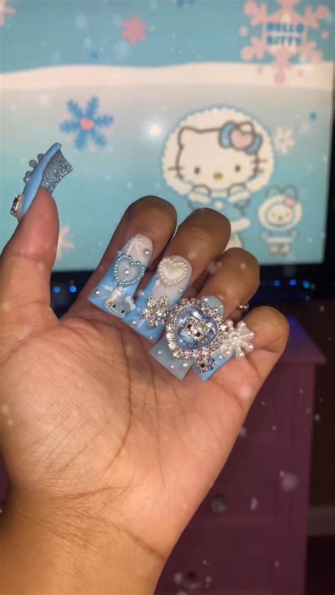 Hello kitty snowflake nails| Blue Snow nails| blue winter nails| blue ...