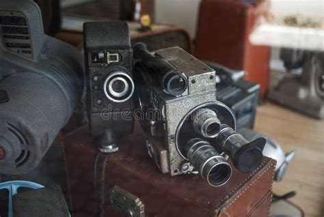 Old Retro Aged Equipment Photo Film Cameras In Shop Window Editorial