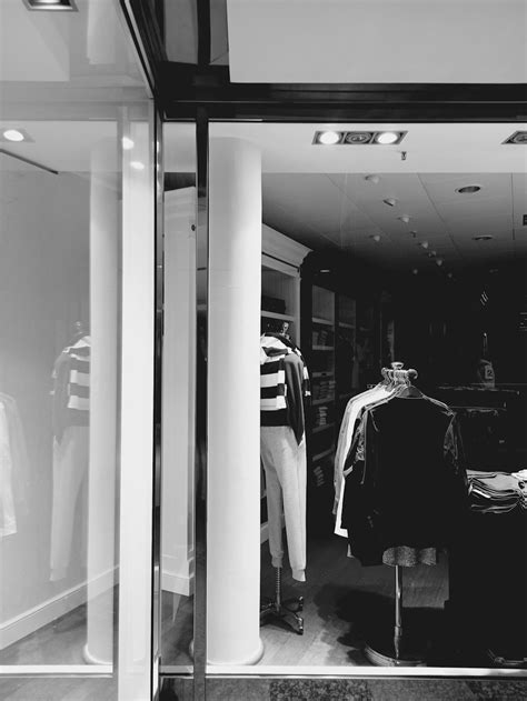 A black and white photo of a clothing store photo – Free Deutschland ...