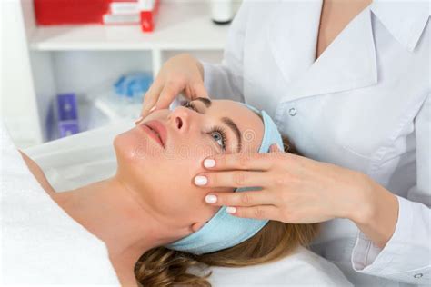 Female Beautician Doctor With Patient In Wellness Center Professional