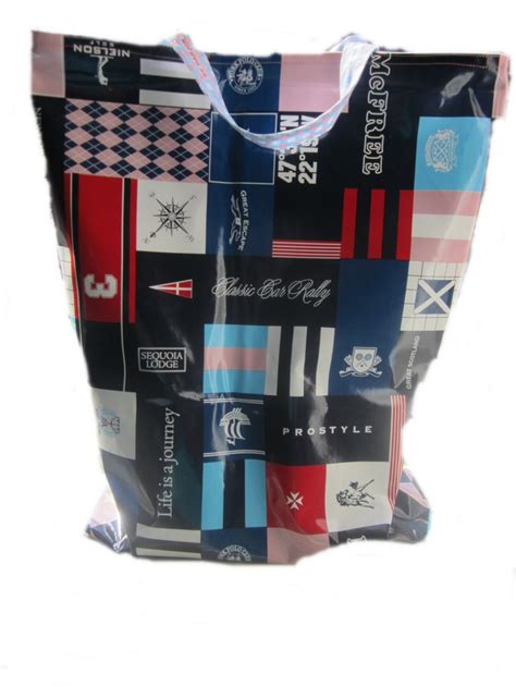 A Shopping Bag With Many Different Designs On The Front And Side All