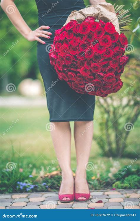 Fashion Beautiful Woman Is Wearing Black Dress Is Holding Big Bouquet