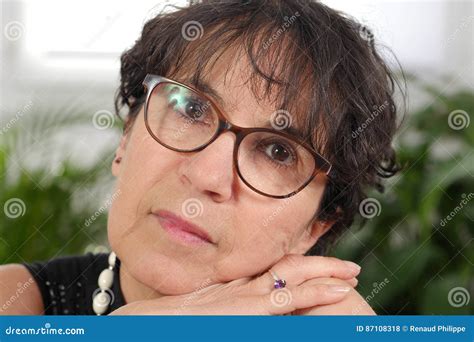 Portrait Of Brunette Mature Woman With Glasses Stock Photo Image Of