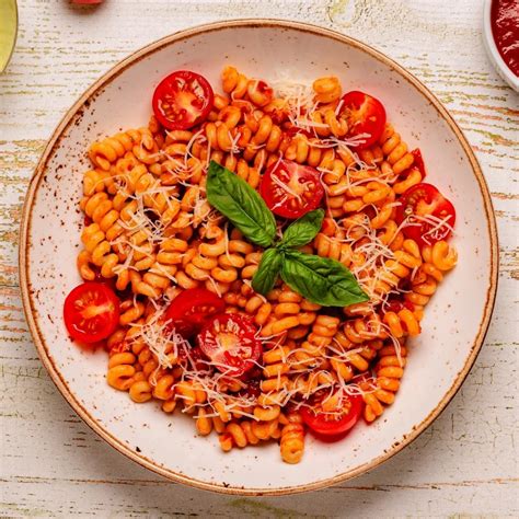 Sauté de poulet marinara fusillis et duo de haricots Antoine ca