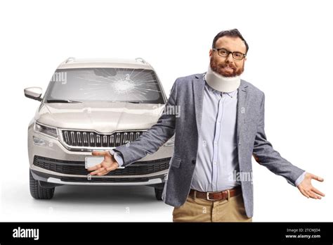 Injured Man With An Orthopedic Neck Collar From A Car Accident Isolated