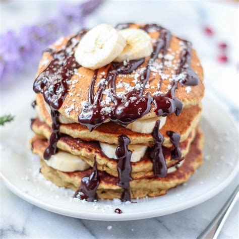 Banana Pancakes With Chocolate Sauce And Sliced Bananas Recipe | The Feedfeed