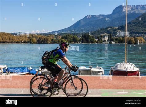 Cycling Path And Cyclists Around Lake Annecy Savoie France Stock