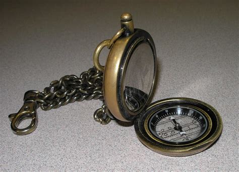 A pocket watch with a compass attached | 18th century pockets, Compass ...