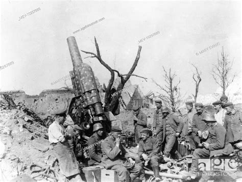 German Troops Resting On The Battlefield By A 21cm Howitzer In France