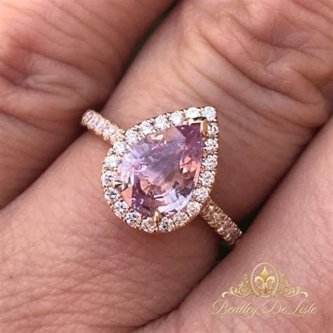 Pear Padparadscha Sapphire Halo Diamond Ring