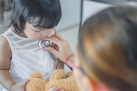 Premium Photo Asian Doctor Using A Stethoscope To Check His Breathing