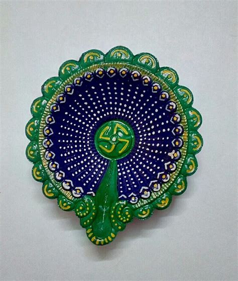 Diwali Diya #Lovely blue/ green diya | Diya decoration ideas, Diwali decoration lights, Diwali ...