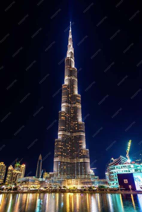 Premium Photo | Night view of a skyscraper tower in Dubai on December ...