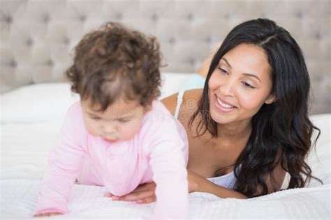 Brunette Playing With Her Baby Stock Photo Image Of Bonding Home
