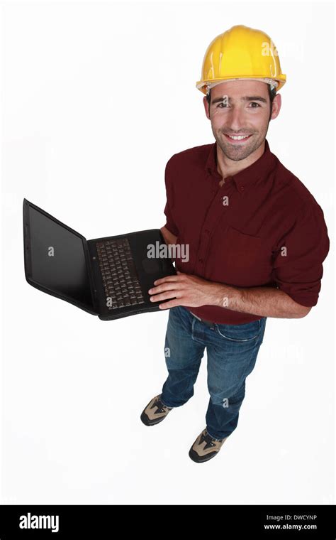 Engineer with a laptop Stock Photo - Alamy