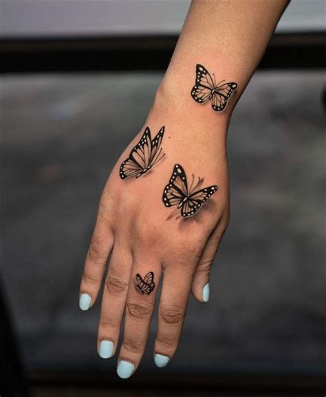 Hand Butterfly Tattoo Designs at Teresa Nehls blog