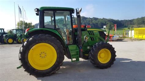 John Deere 6115m Prices Specs And Trends