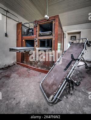 old abandoned hospital morgue and gurney Stock Photo - Alamy