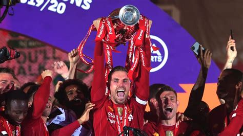 Liverpool Captain Jordan Henderson Lifting The Premier League Trophy