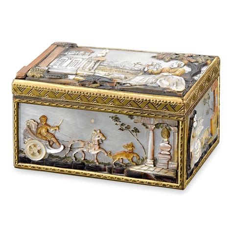 An Ornately Decorated Box With Pictures On It