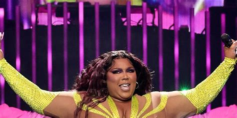 Lizzo Channels Spider Woman In A Neon And Nude Illusion Catsuit