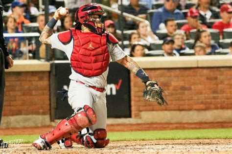 What Pros Wear: Yadier Molina’s Jordan Catchers Gear (Chest Protector ...