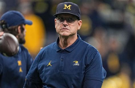 A Poetic Return After 3 Game Suspension Jim Harbaugh Returns To Win Big Ten Championship