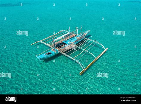 aerial drone view  traditional philippine boat bangka anchored