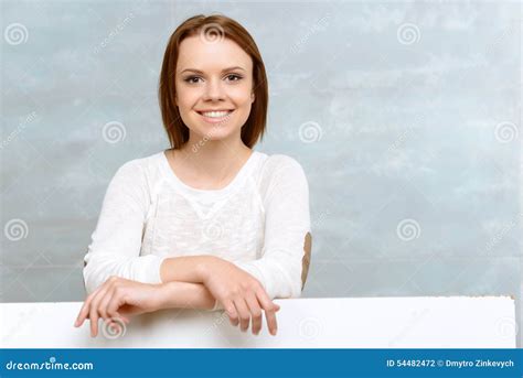 Smiling Girl Leaning On Her Elbows Stock Photo Image Of Face Glass