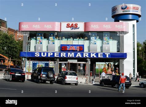 Cars park in front of a SAS supermarket in Yerevan, Armenia, 22 June ...