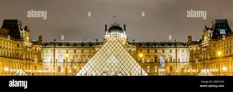 Louvre Museum with Louvre Pyramid at Night, Paris Stock Photo - Alamy