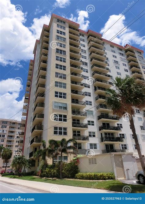 modern apartment buildings  palm trees  miami view  road editorial stock photo