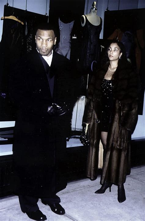 Mike Tyson and Monica Turner at a BMG party Photo Print (8 x 10 ...