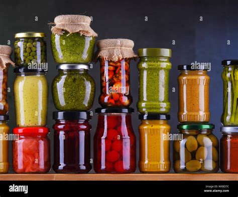 Jars With Variety Of Pickled Vegetables And Fruits Preserved Food