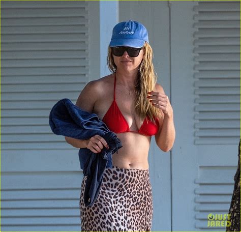 Alice Eve Wraps Up Summer In A Red Bikini During Barbados Beach