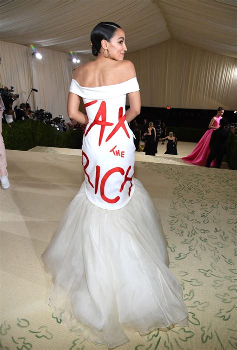 Alexandria Ocasio-Cortez Wears "Tax The Rich" Gown to 2021 Met Gala