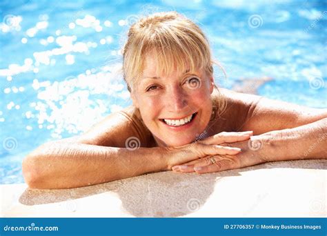 Senior Woman Having Fun In Swimming Pool Stock Image Image Of Retired